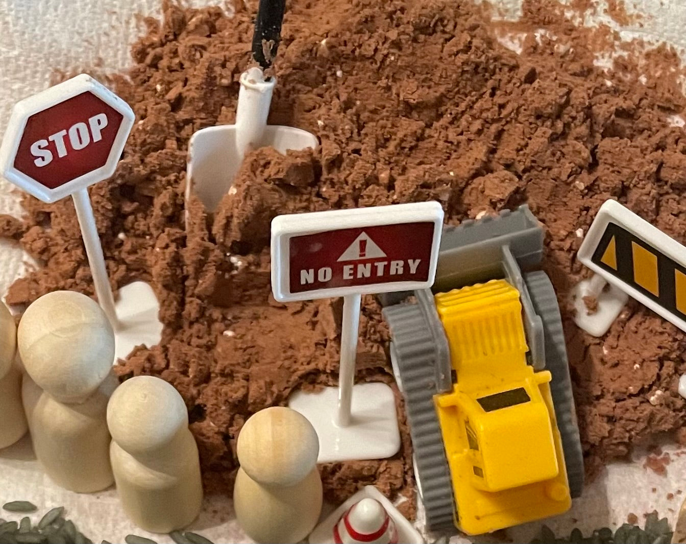 Pour and play dirt for sensory play (Construction theme)